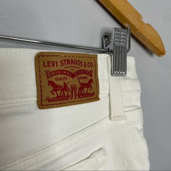 Levi’s Distressed Mid-Length White Shorts - Picture 7 of 9